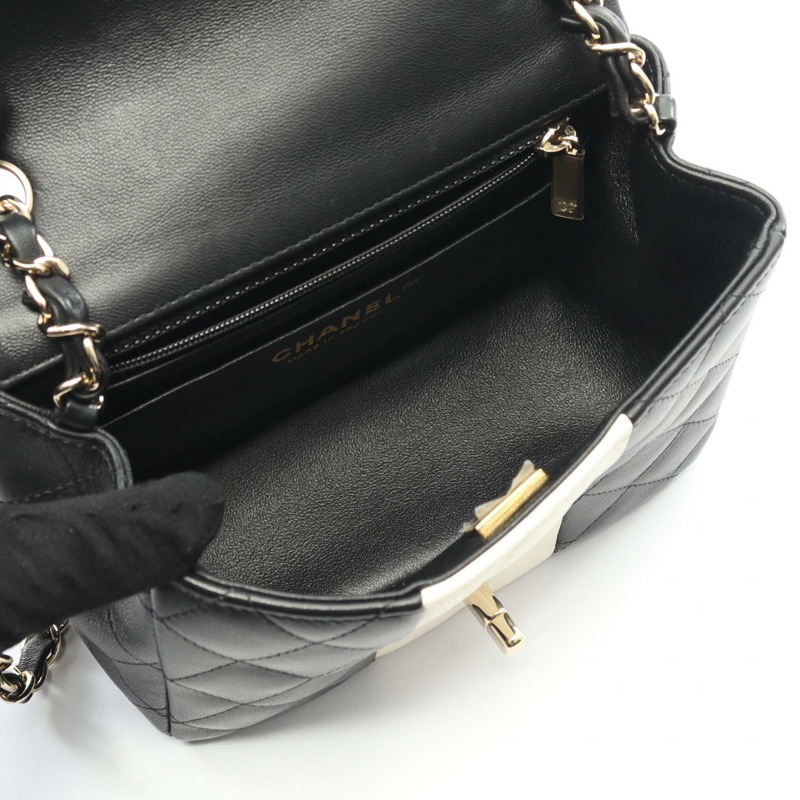 香奈兒迷你絎縫鏈條肩背斜背包，黑色白色皮革，金色五金，二手-2