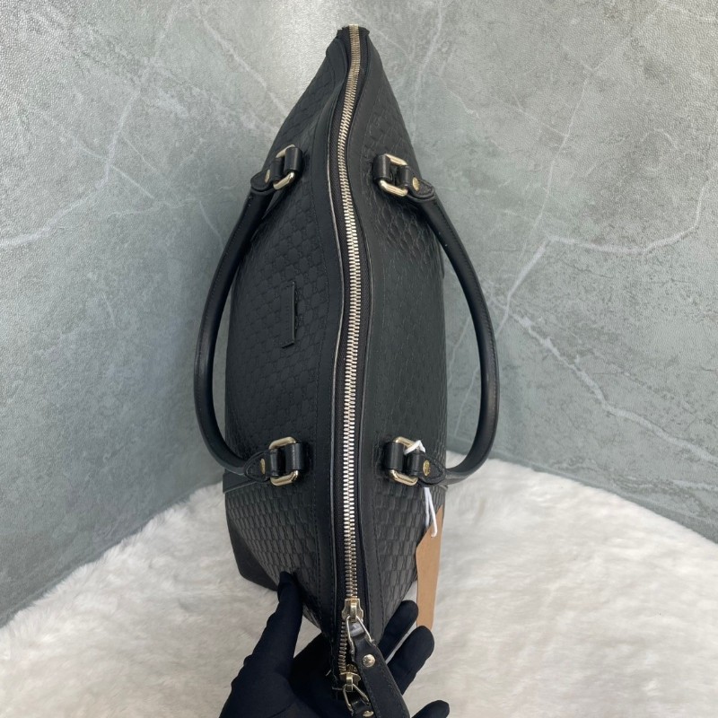 GUCCI 黑色牛皮老花壓印手提包-2