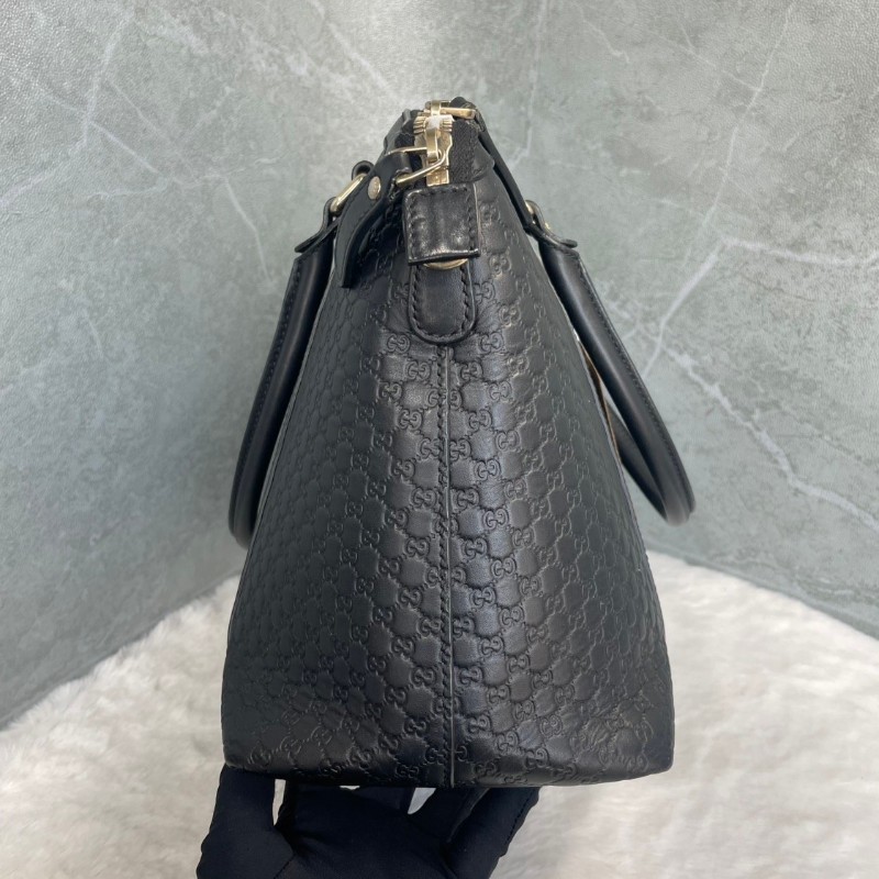 GUCCI 黑色牛皮老花壓印手提包-4