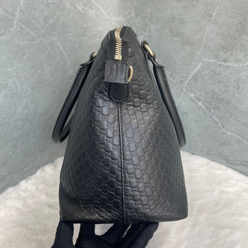 GUCCI 黑色牛皮老花壓印手提包-5