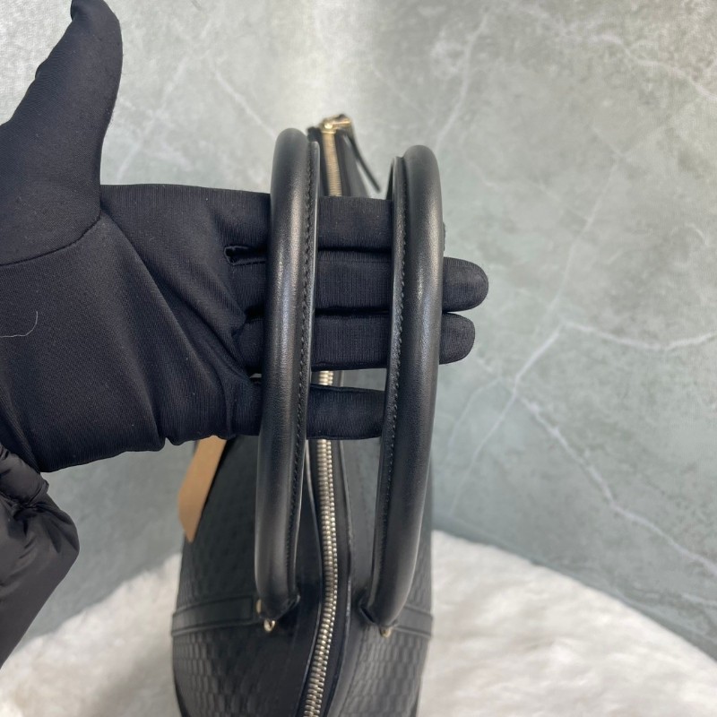 GUCCI 黑色牛皮老花壓印手提包-7