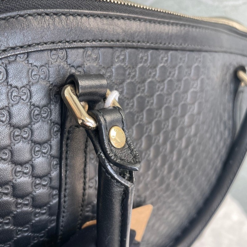 GUCCI 黑色牛皮老花壓印手提包-14