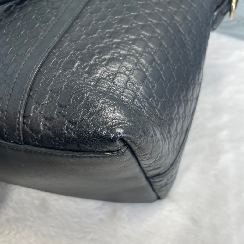 GUCCI 黑色牛皮老花壓印手提包-18