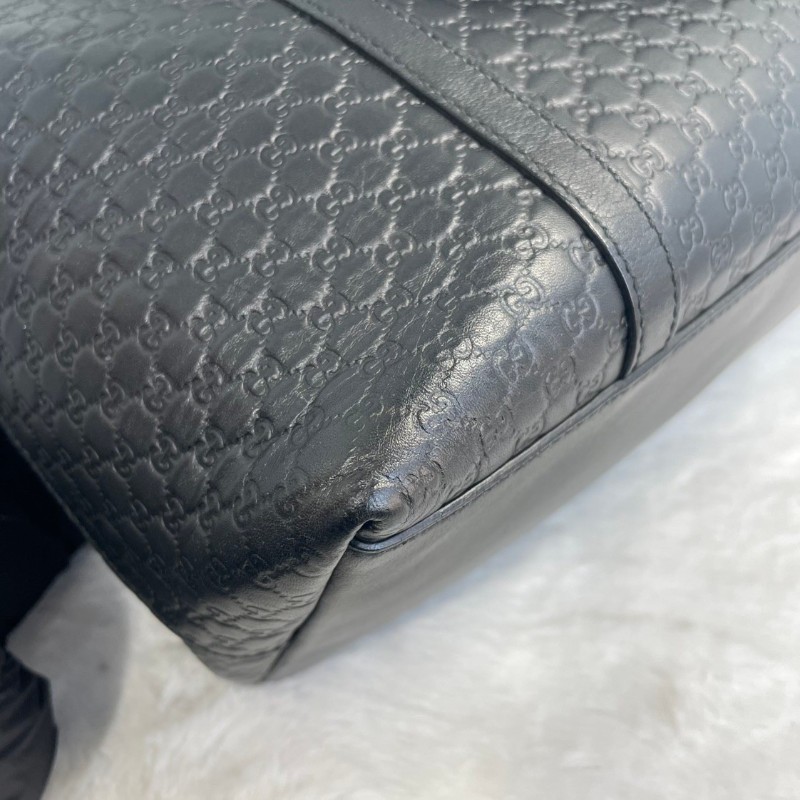 GUCCI 黑色牛皮老花壓印手提包-19