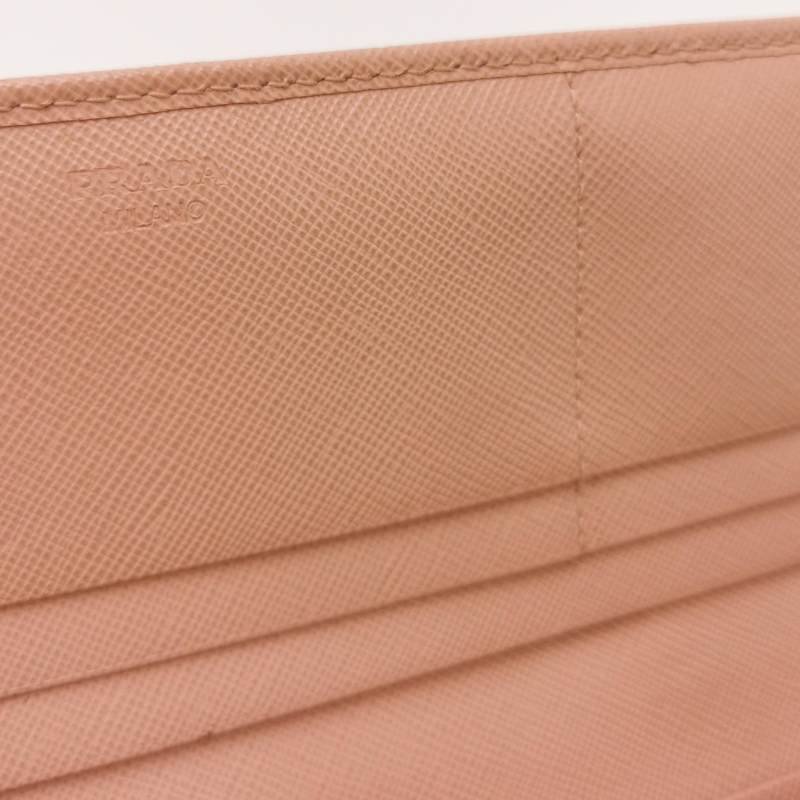 Prada牛皮純色字母Logo蝴蝶結錢包-6