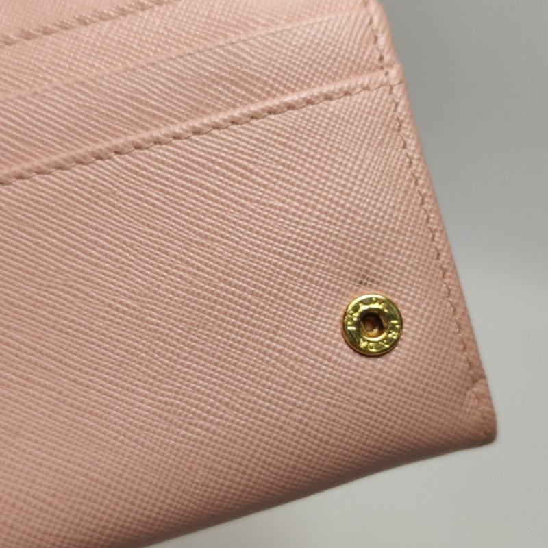 Prada牛皮純色字母Logo蝴蝶結錢包-15