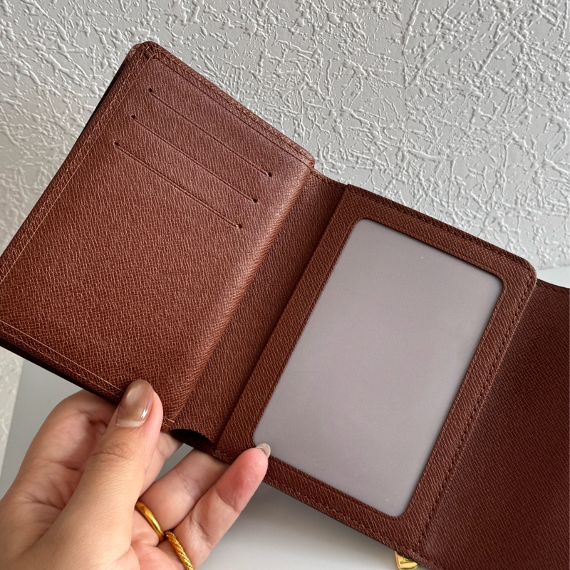 LV花紋金釦烏瑪舒曼三折短夾-24