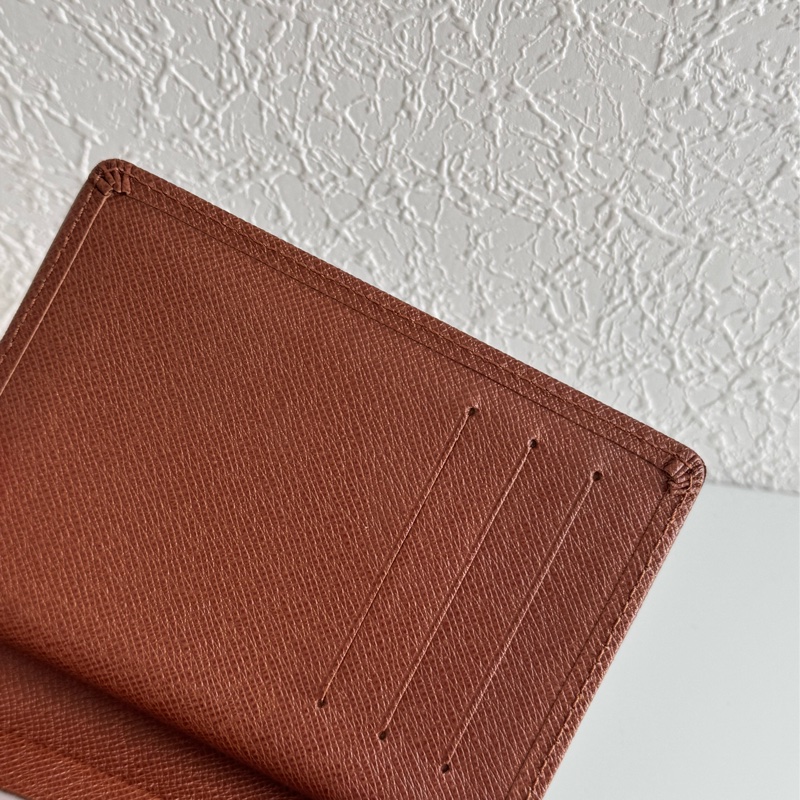 LV花紋金釦烏瑪舒曼三折短夾-26