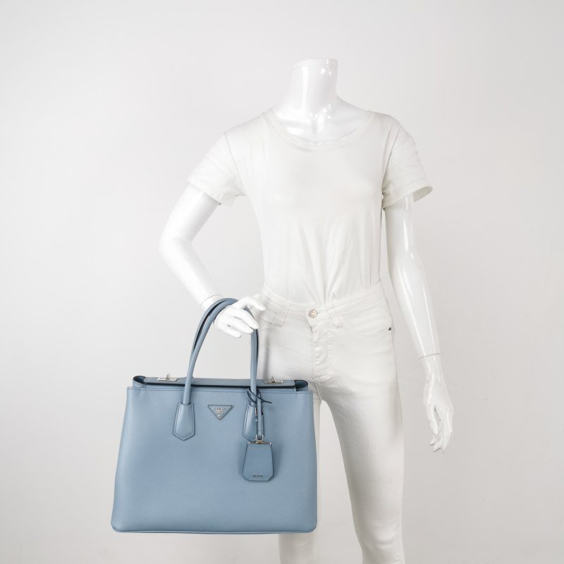 Prada牛皮純色三角徽標手提包-1