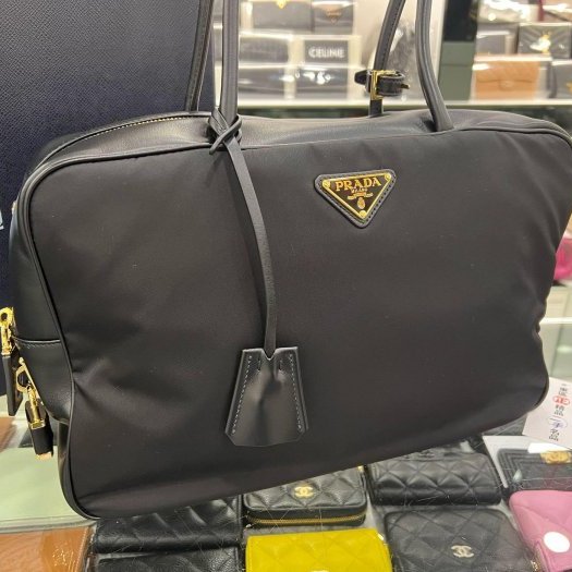 東區正精品㊣PRADA 1BB131 黑色尼龍金三角牌皮革背帶手提包肩背包保齡球包 RZ6130-1