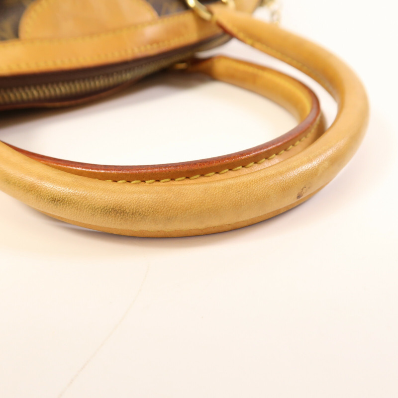 LOUIS VUITTON Monogram Tivoli PM金扣手挽袋棕色-9