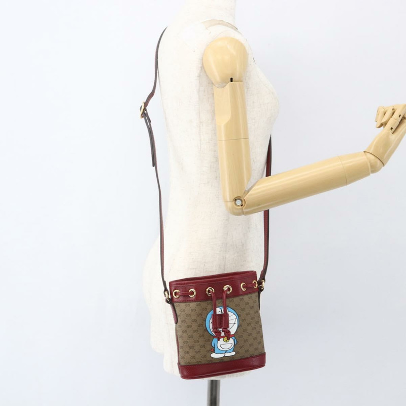 【日本直送】GUCCI Micro GG Supreme哆啦A夢肩包 PVC 米色 647801 正品 159307SAM-20