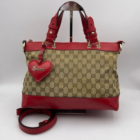 Gucci/古驰 爱心型挂饰帆布拼皮手提肩背包