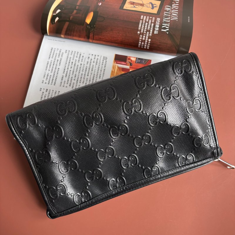 ::GUCCI:: 625568 黑色雙G壓紋皮革手拿包-1