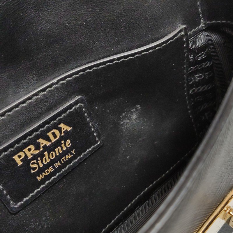 Prada Sidonie牛皮純色字母logo書封式插扣單肩包-8