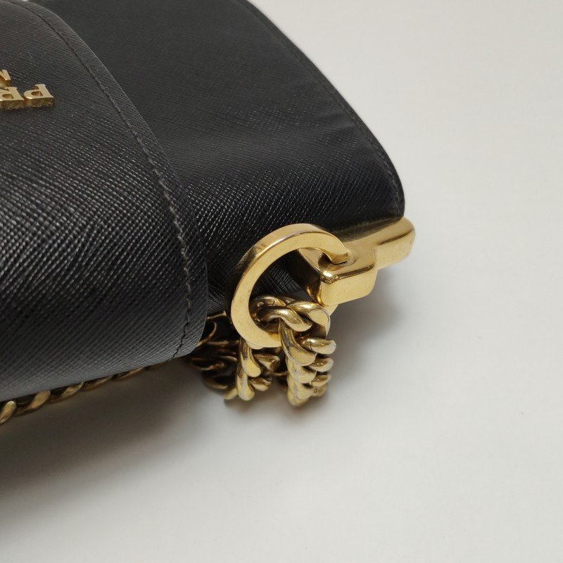 Prada Sidonie牛皮純色字母logo書封式插扣單肩包-10