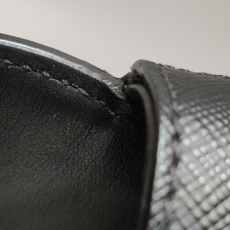 Prada Sidonie牛皮純色字母logo書封式插扣單肩包-12