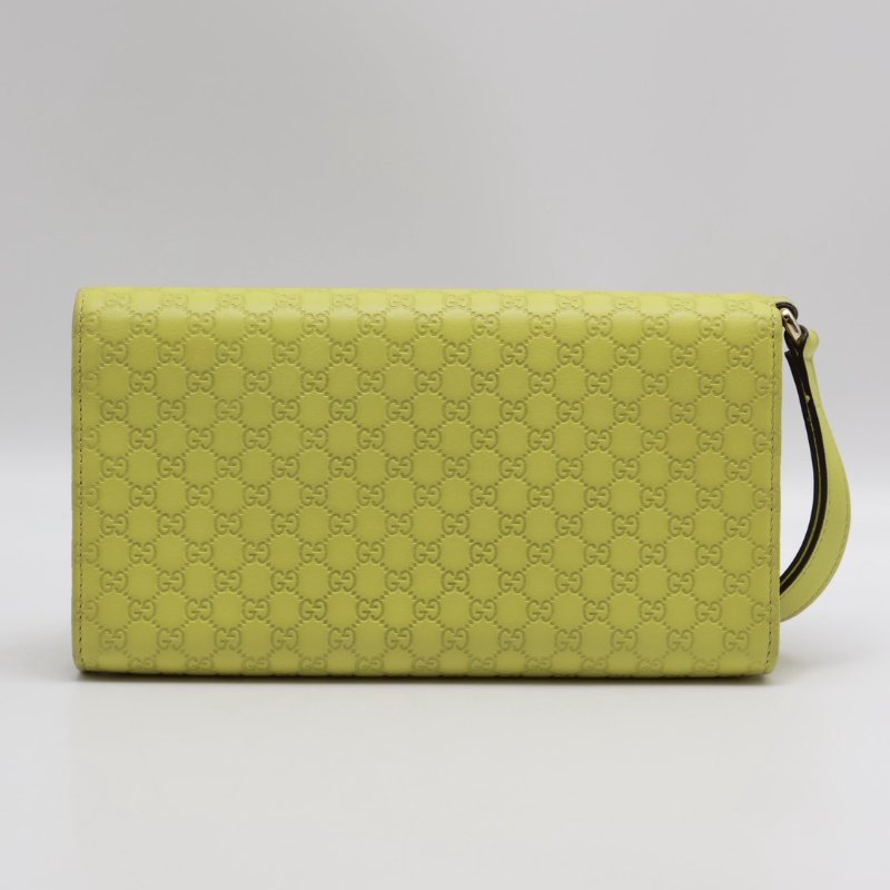 GUCCI 雙G壓紋四合一手拿包-1