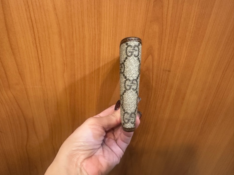 Gucci PVC咖牛皮Interlocking對開8卡短夾-2