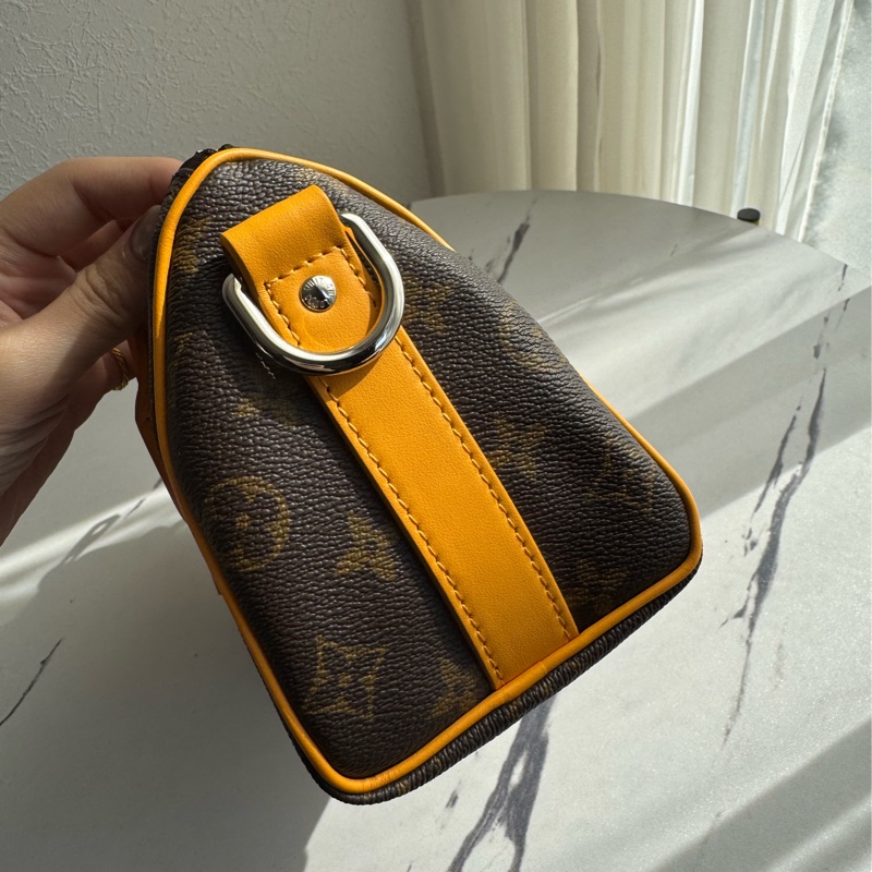 Lv花紋黃邊keepall25手提兩用包 超經典-3