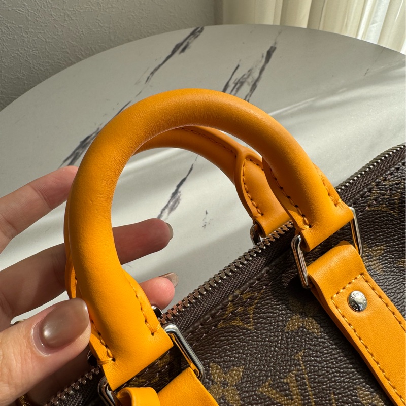 Lv花紋黃邊keepall25手提兩用包 超經典-5