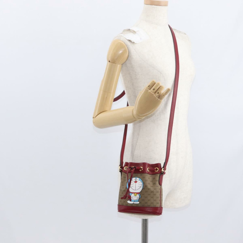 【日本直送】GUCCI Micro GG Supreme哆啦A夢肩包 PVC 米色 金色 647801 正品 161141SM-21