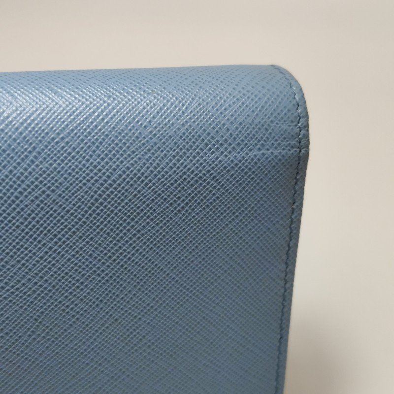 Prada牛皮純色字母Logo斜挎包單肩包-13