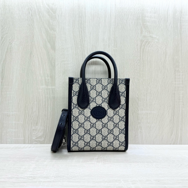 GUCCI原花拼深藍色牛皮INTERLOCKING GG琴譜包671623-0