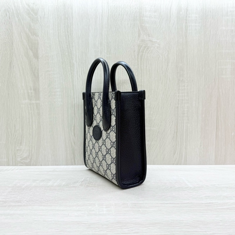 GUCCI原花拼深藍色牛皮INTERLOCKING GG琴譜包671623-2