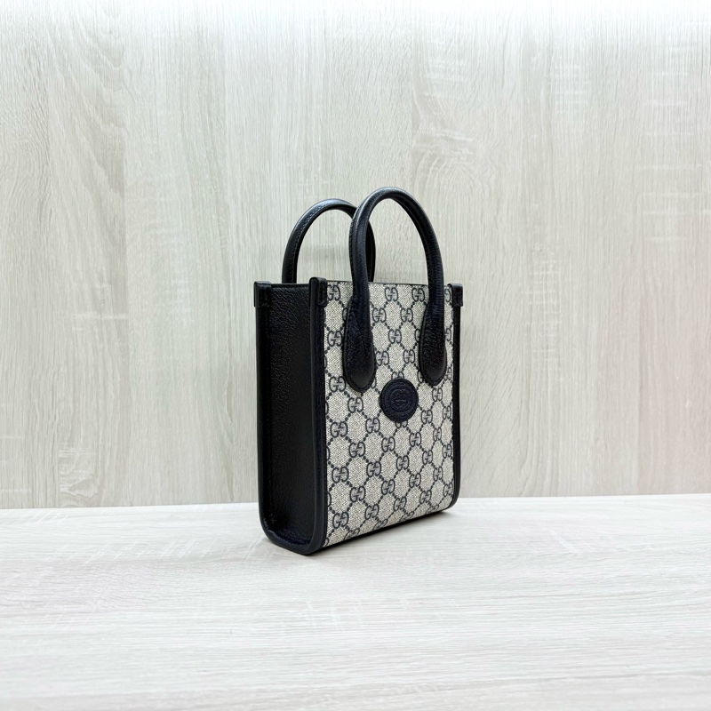 GUCCI原花拼深藍色牛皮INTERLOCKING GG琴譜包671623-3