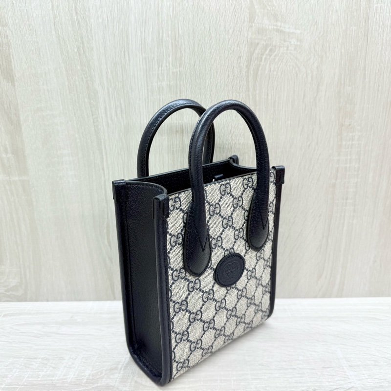 GUCCI原花拼深藍色牛皮INTERLOCKING GG琴譜包671623-4