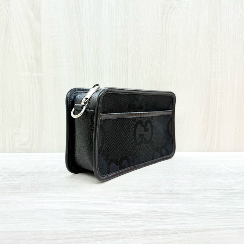 GUCCI黑色帆布拚皮革JUMBO GG拉鍊相機包696075-3
