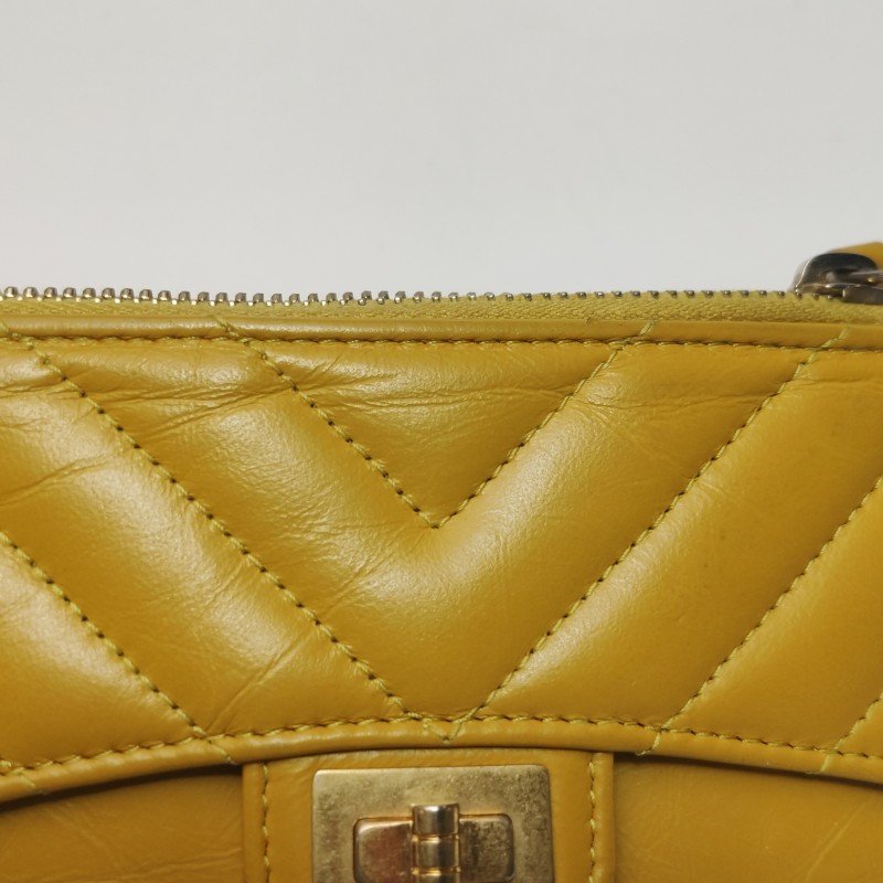 Chanel 2.55Bag油蠟皮純色V紋矩形旋扣卡包-18