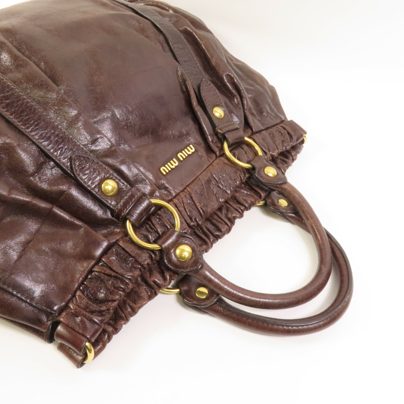 Miu Miu 牛皮皮革Vitello Lux金扣手挽袋-4
