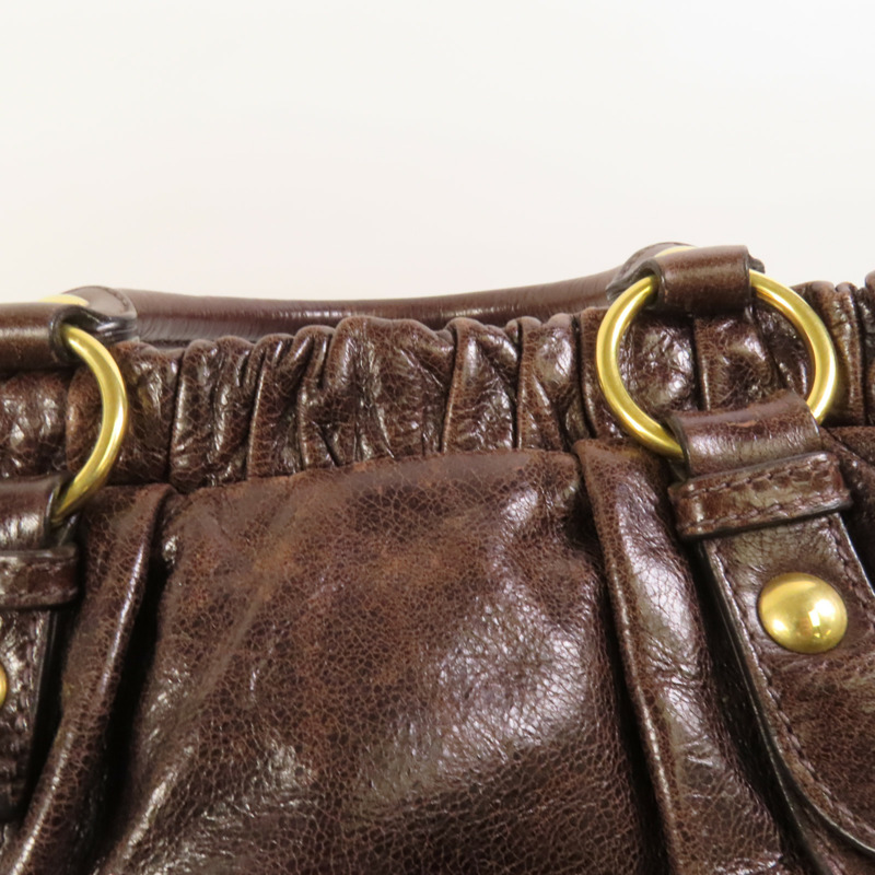 Miu Miu 牛皮皮革Vitello Lux金扣手挽袋-14