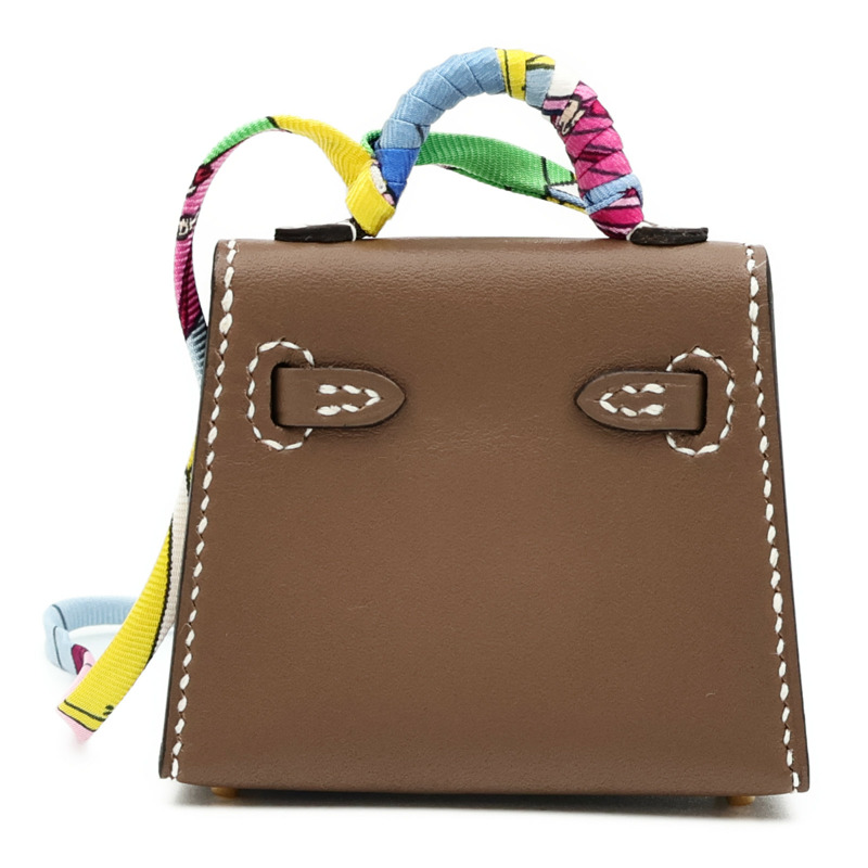 HERMES Tadelakt皮革Kelly Twilly Bag Charm金扣掛飾Etoupe-1