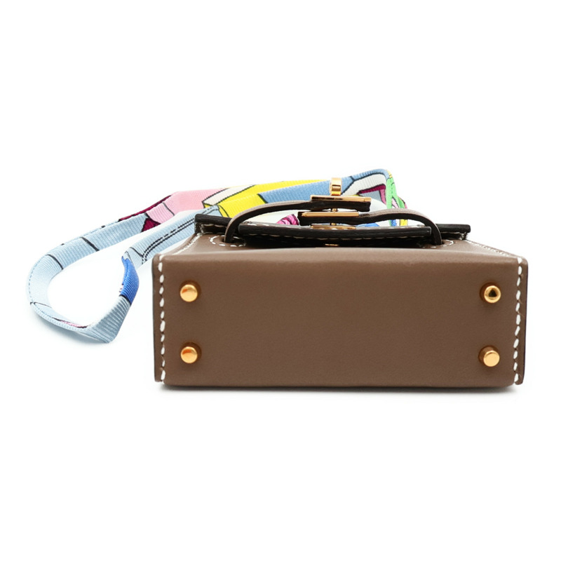 HERMES Tadelakt皮革Kelly Twilly Bag Charm金扣掛飾Etoupe-2