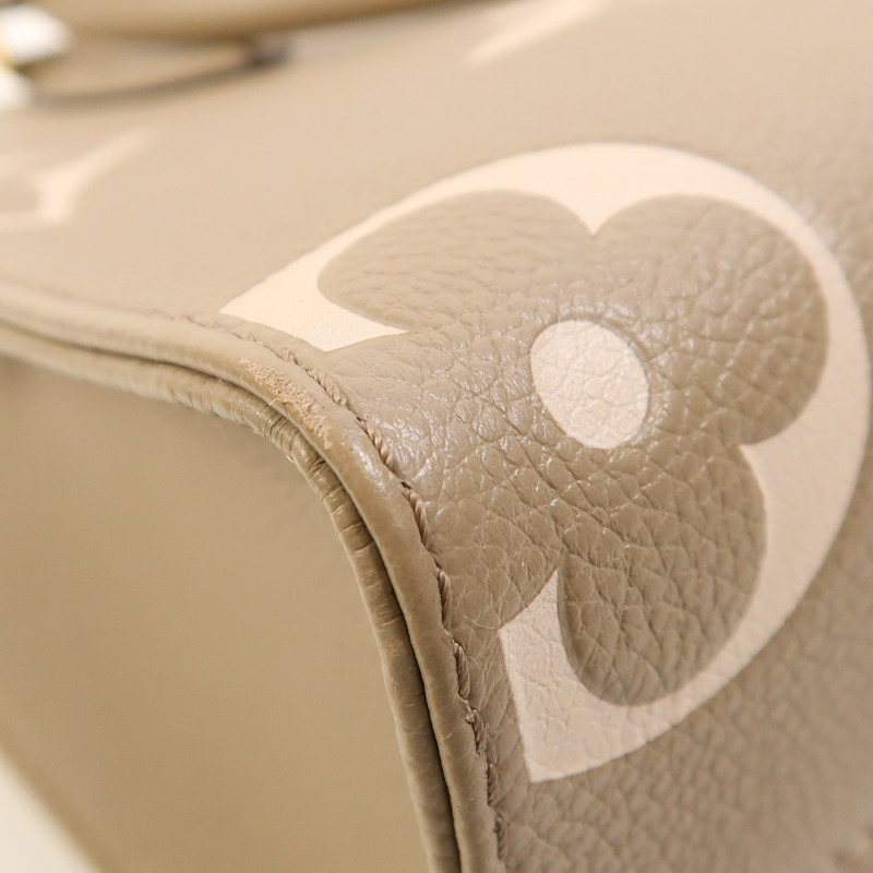 LOUIS VUITTON Monogram Empreinte OnTheGo PM金扣手挽袋-11