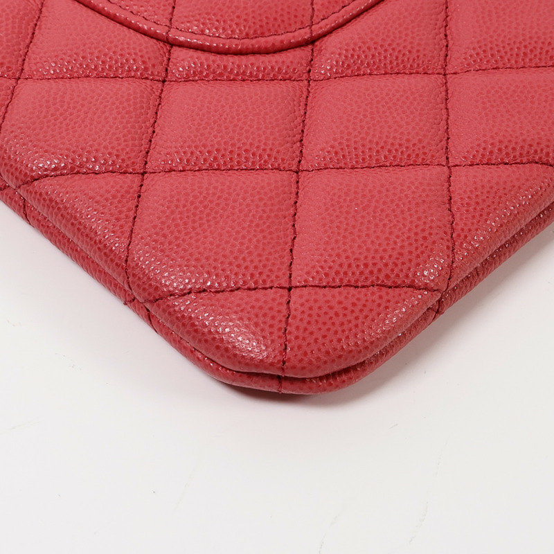 CHANEL 牛皮皮革Pouch金扣手拿包-10