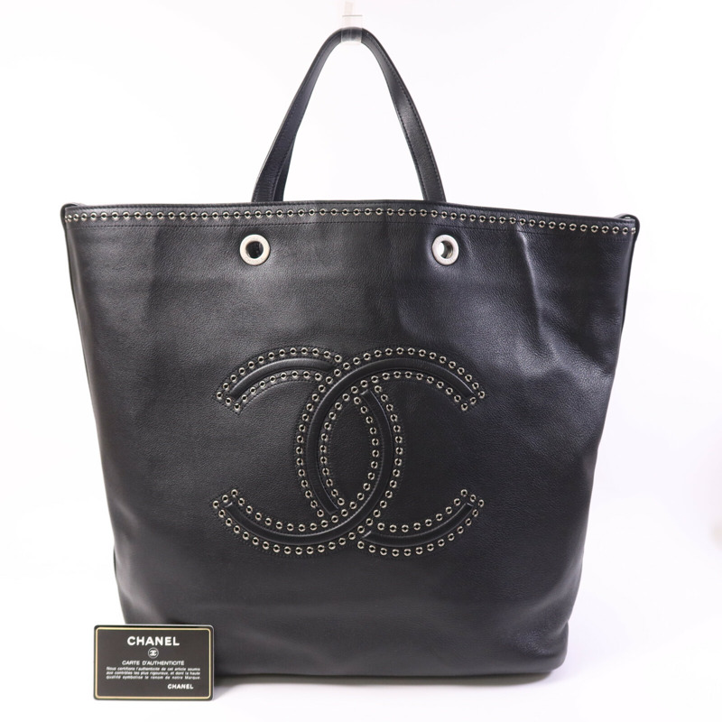 CHANEL 牛皮皮革Coco Eyelets銀扣手挽袋-8