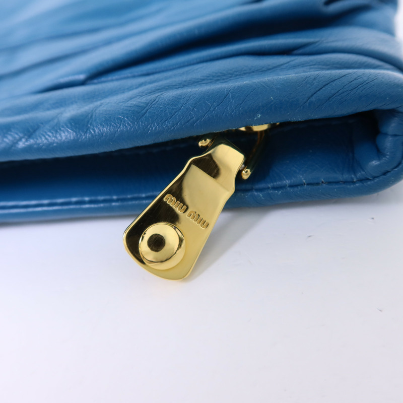 Miu Miu 牛皮皮革Clutch Bag金扣手拿包-7