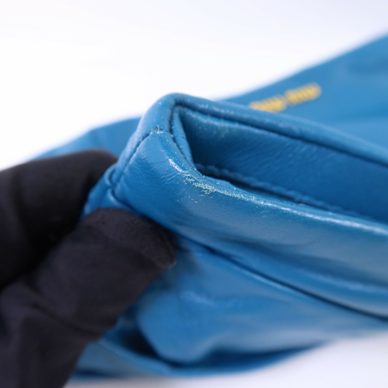 Miu Miu 牛皮皮革Clutch Bag金扣手拿包-13