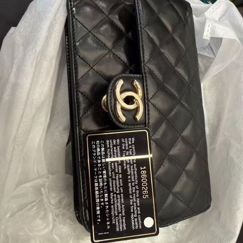 CHANEL BLACK AND GOLDEN METAL