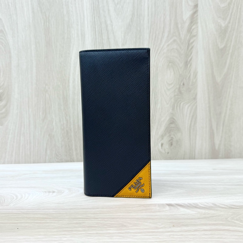PRADA深藍拼三角橘銀釦Saffiano牛皮13卡對開長夾2MV836-0