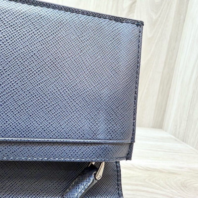 PRADA深藍拼三角橘銀釦Saffiano牛皮13卡對開長夾2MV836-11