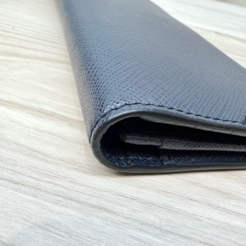 PRADA深藍拼三角橘銀釦Saffiano牛皮13卡對開長夾2MV836-12