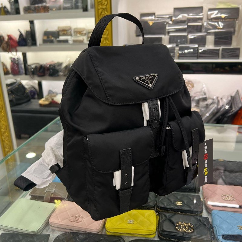 東區正精品㊣PRADA 1BZ677 全新黑色尼龍銀三角束口前雙口袋磁釦後背包小款 RZ6039-2
