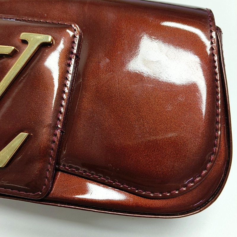 LOUIS VUITTON SOBE酒紅色漆皮手拿包金色五金-10