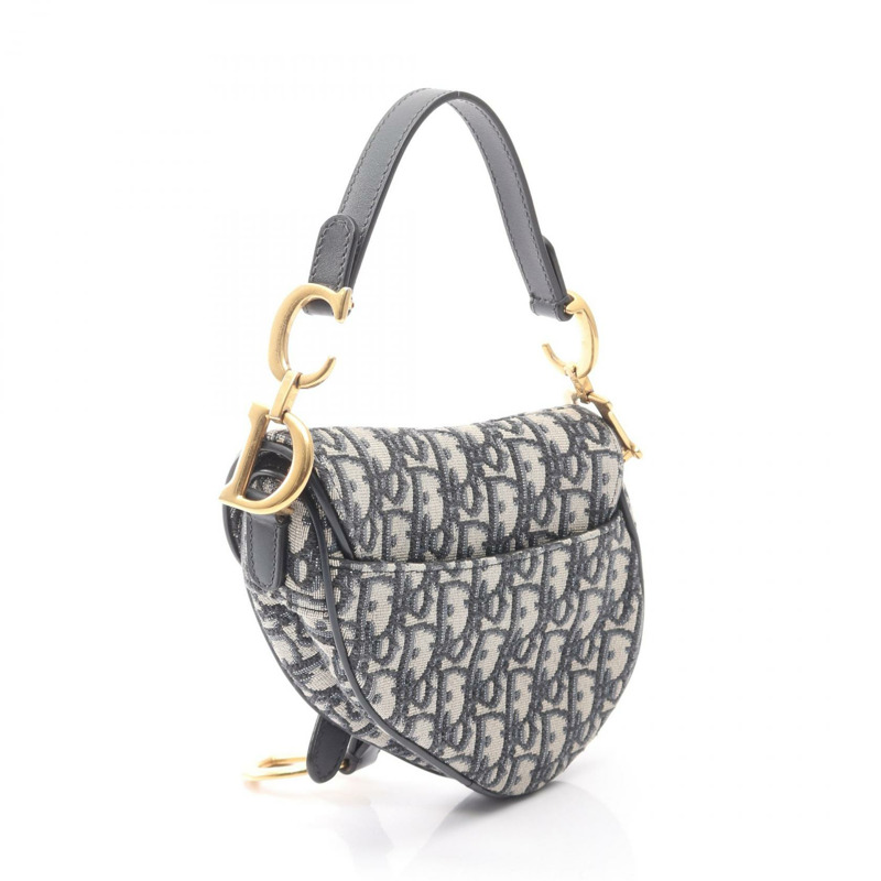 Christian Dior 迷你馬鞍斜背包，提花皮革，米色、海軍藍、黑色-1