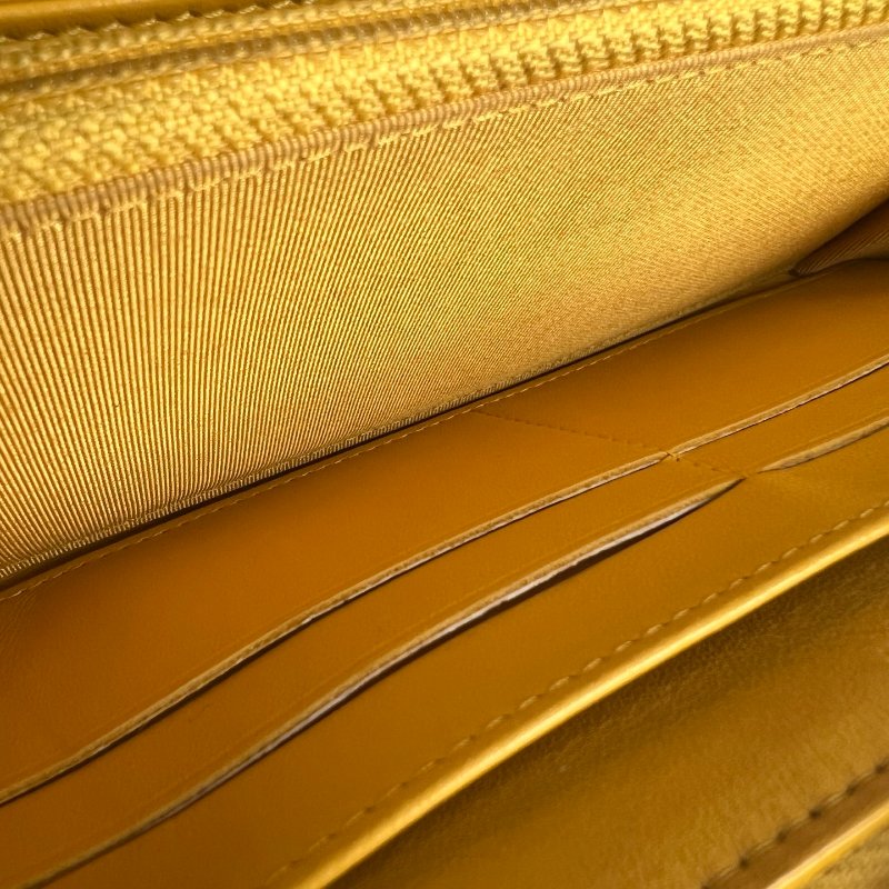 CHANEL 黃荔枝ㄇ拉長夾 25開-8